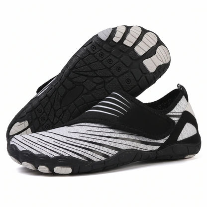 Natueva lichte & flexibele barefoot schoenen – Zwart-wit, zijaanzicht en zool